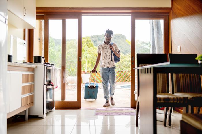 Man checking into room