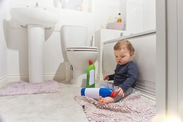 https://media.consumeraffairs.com/files/cache/news/Baby_or_toddler_with_cleaning_chemicals_MartinPrescott_Getty_Images_medium.webp