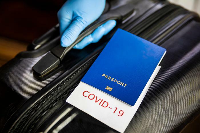 COVID-19 travel concept with passport