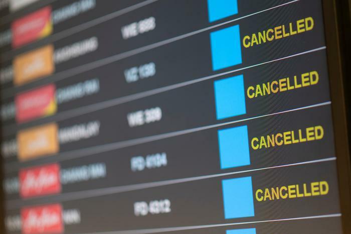 Flight information board with canceled flights