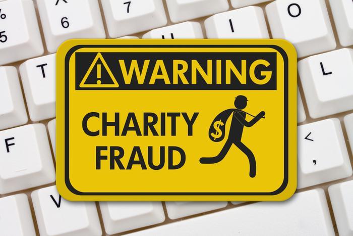 Charity scam or fraud concept