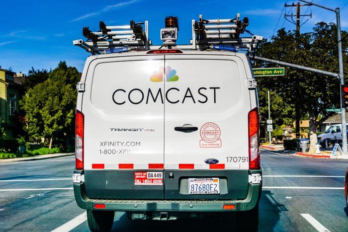 Comcast and Xfinity van on road