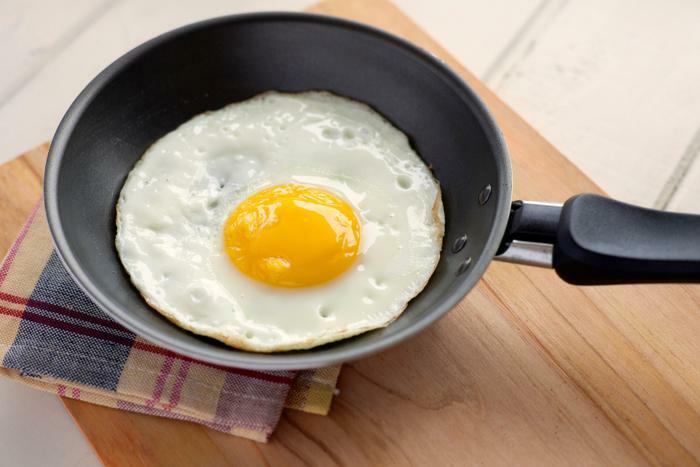 Cooking an egg concept