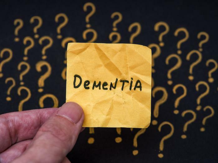 Dementia concept with post-it note