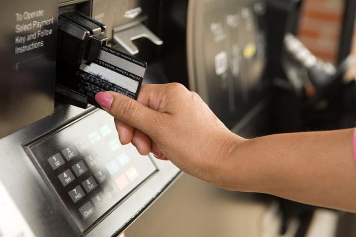 Gas prices and paying for gas concept