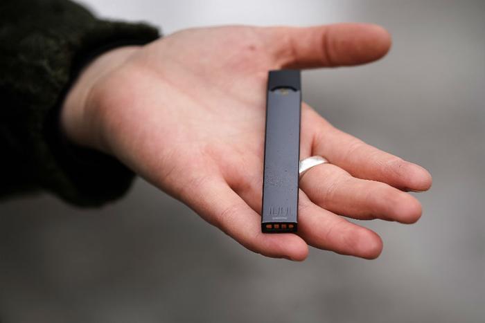 Juul device in hand