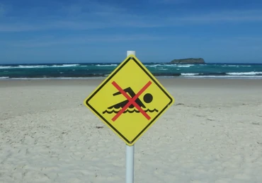 https://media.consumeraffairs.com/files/cache/news/No_swimming_beach_sign_ReadySteadyPix_Getty_Images_medium.webp