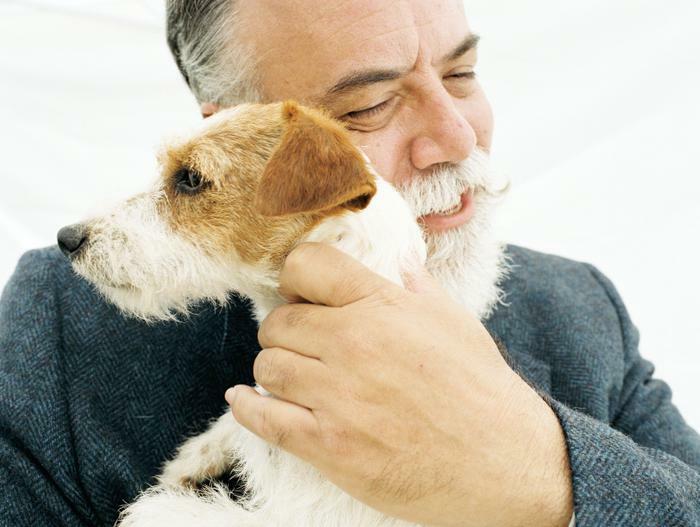 Older man with pet dog 