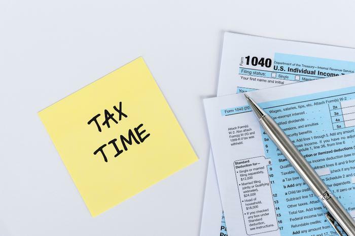 Paying taxes and tax time concept