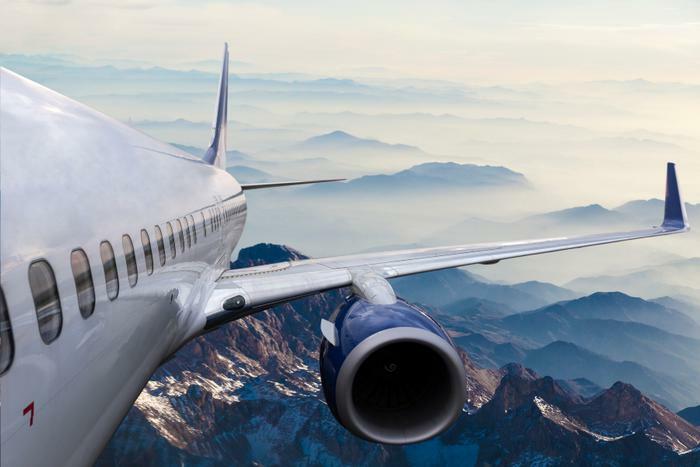Plane flying over mountains