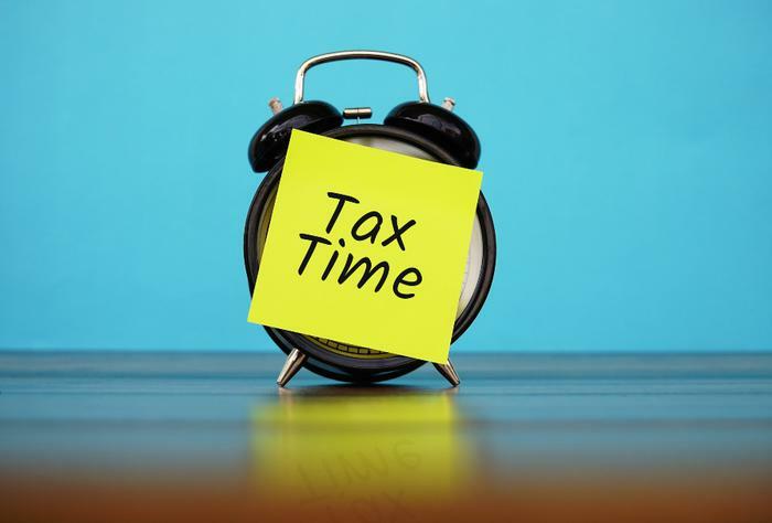 Tax time concept with clock