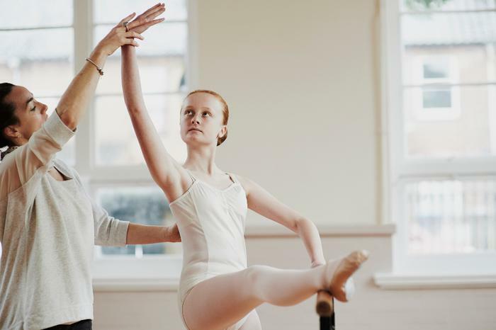 Teen girl in ballet class