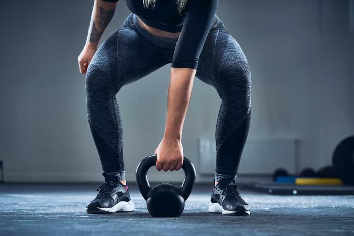 Woman lifting weights 