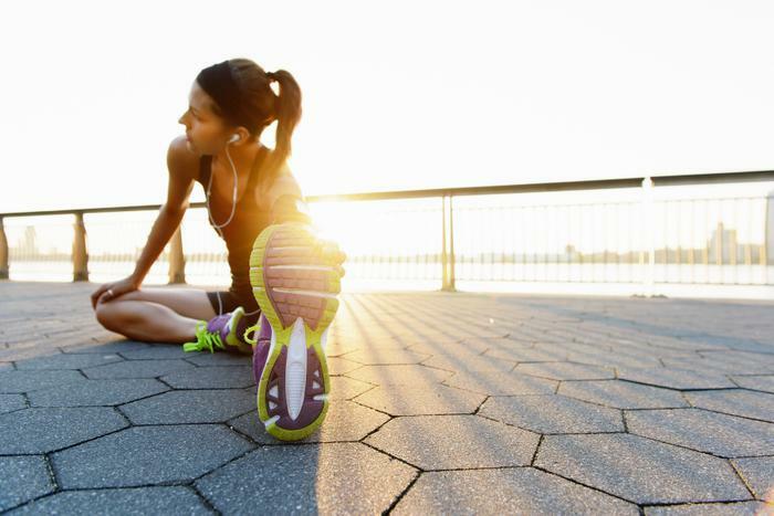 Woman stretching before running
