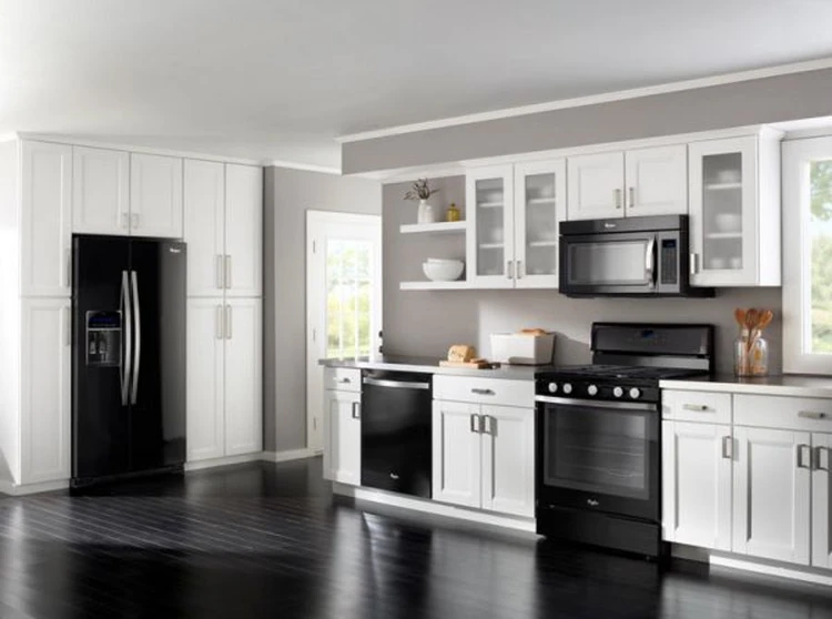colored kitchen cabinets with black appliances