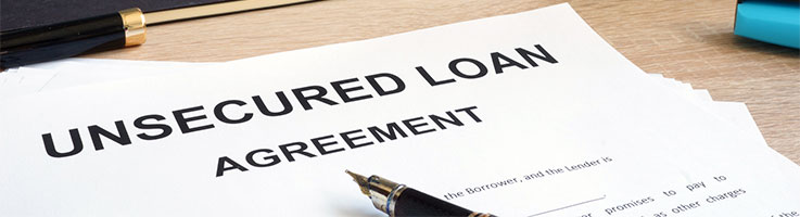 unsecured loan agreement form with pen on top