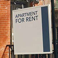 for rent signage in front of apartment