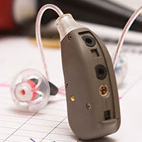 a pair of bluetooth hearing aids