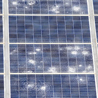 solar panels damaged by the impact of stones of hail