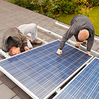 solar panels being installed on roof