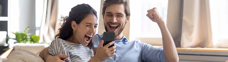 couple excited approved for online loan