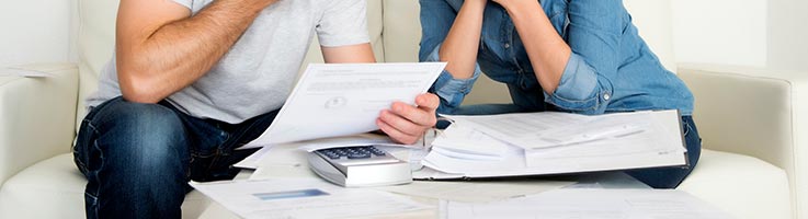 couple looking at bills