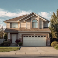 a two-story house with an attached garage