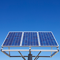 solar panels against blue sky