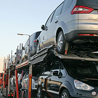 cars on loading truck