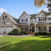 beautiful home with big front lawn
