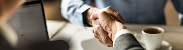 two men shaking hands