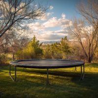 a trampoline in a yard