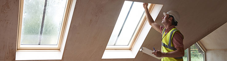 man inspecting property