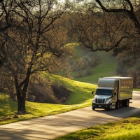 a moving truck on a street in Kansas