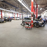 service center with cars being repaired