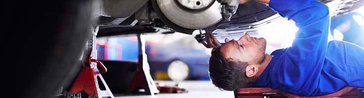 man working on car