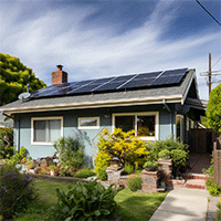house and garden with solar panels