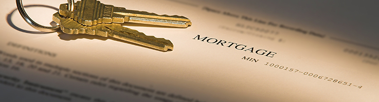 mortgage paperwork with house keys
