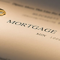 mortgage paperwork with house keys