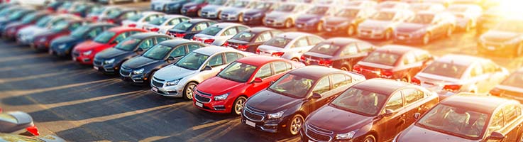 new cars lined up on lot