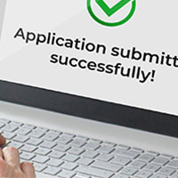 person submitting mortgage application on computer