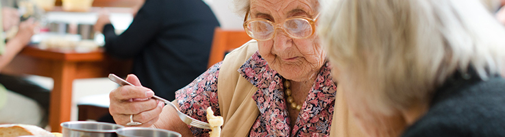 senior woman enjoying meal