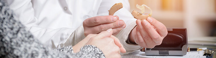 a pair of rechargeable hearing aids