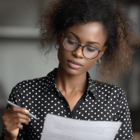 young lady filling out a loan application form