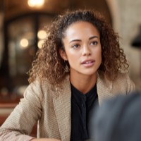 a woman talking to someone