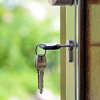 key hanging from front door