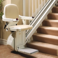 a stair lift at the bottom of stairs