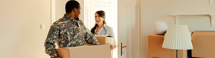 veteran moving box with woman