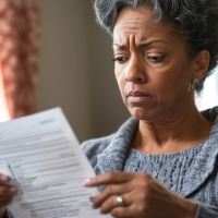 a woman reading a document