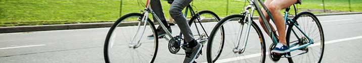 College friends riding bikes together